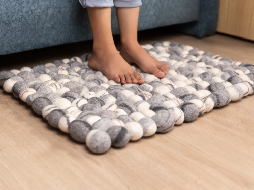 Black Striped Felt Pebble Rug
