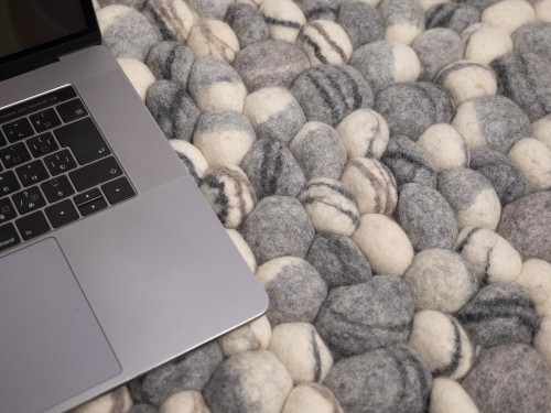 Black Striped Felt Pebble Rug
