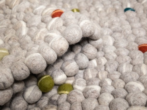 Playful Multicolor White Felt Pebble Rug