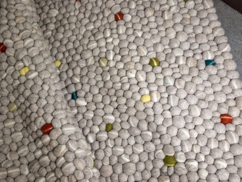 Playful Multicolor White Felt Pebble Rug