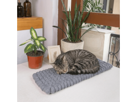 Handmade wool felt ball cat mat used inside home interior