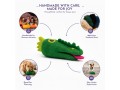 Product image of wool felt alligator head dog chew toy features gray landscape in gray