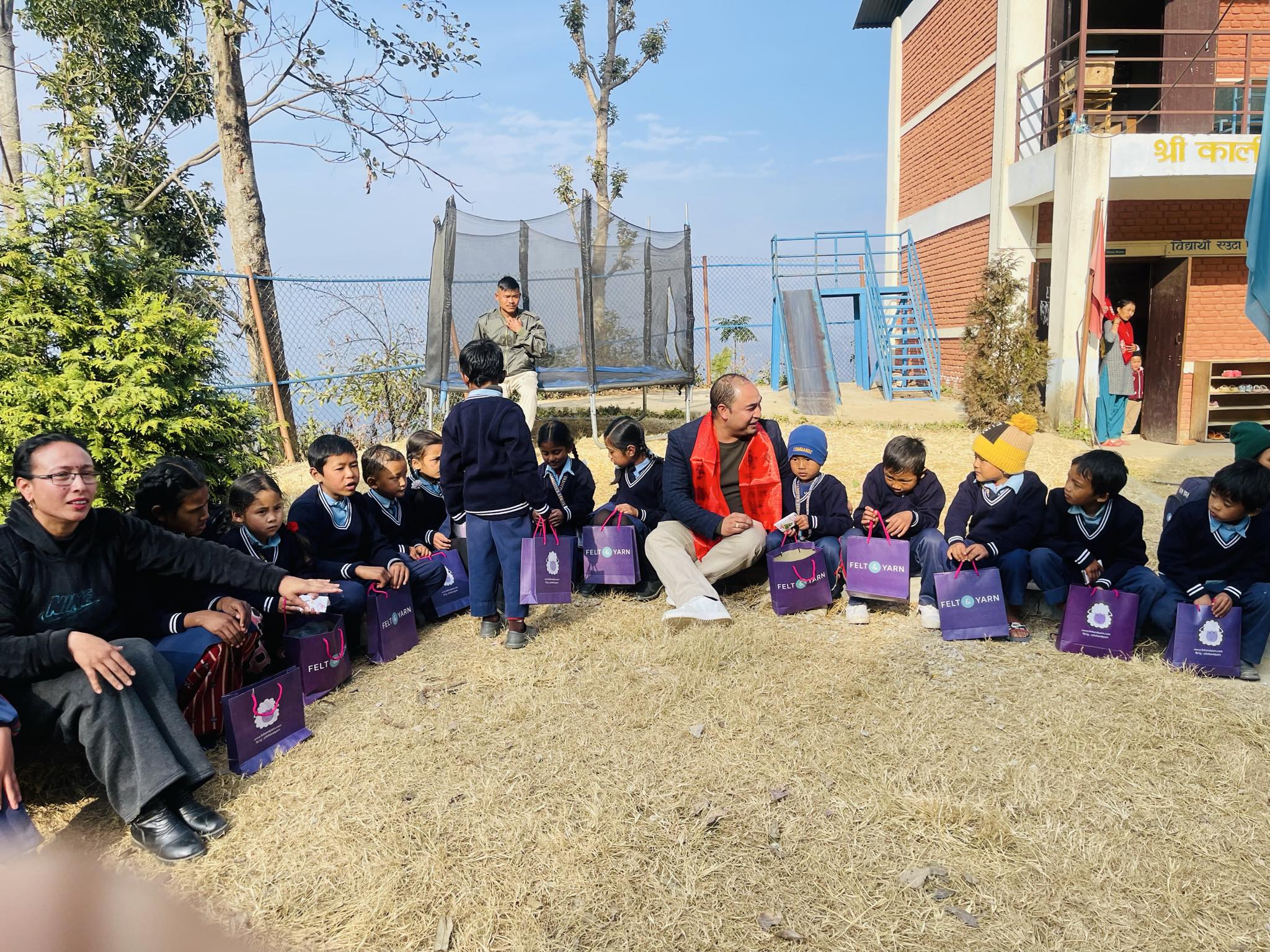 Children wearing Felt and Yarn jackets during the Kalidevi Ma Vi community outreach program